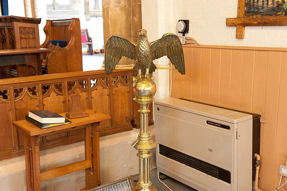eagle lectern in nave below steps to chancel opposite side to pulpit (May 2019)