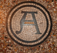 Alpha on left side of altar mosaic floor (May 2019)