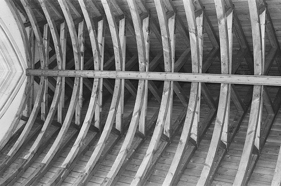 Chancel roof meeting the top of the arch to the nave  at left side of photo (May 2019)